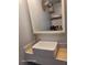 Renovated bathroom sink with new counter and storage under the sink at 2005 Blue Lake Dr, Lakeland, FL 33801
