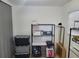 A general view of the storage room with plastic tubs and shelving at 2005 Blue Lake Dr, Lakeland, FL 33801