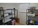 The storage room is neat and has two metal shelving racks at 2005 Blue Lake Dr, Lakeland, FL 33801