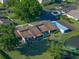 Aerial view of homes with private patios, pond, and green spaces at 2025 Sylvester Rd # P4, Lakeland, FL 33803