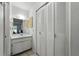 Bright bathroom with a sink and closet at 2025 Sylvester Rd # P4, Lakeland, FL 33803