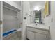 Bright bathroom with a walk-in shower featuring white tiling and a simple vanity at 2025 Sylvester Rd # P4, Lakeland, FL 33803