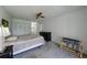 Cozy bedroom featuring a ceiling fan, closet and dresser at 2025 Sylvester Rd # P4, Lakeland, FL 33803