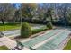 Overhead view of the community shuffleboard courts, beautifully landscaped and ready for a friendly competition at 2025 Sylvester Rd # P4, Lakeland, FL 33803
