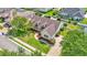 Aerial view of the home showcasing the well-maintained yard and landscaping at 2025 Viewpoint Landings Rd, Lakeland, FL 33810
