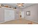 Bright bedroom featuring a spacious closet and neutral carpet flooring, perfect for relaxation at 2025 Viewpoint Landings Rd, Lakeland, FL 33810