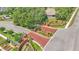 Community entrance featuring a red brick drive and beautiful landscaping at 2025 Viewpoint Landings Rd, Lakeland, FL 33810