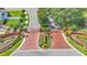 Aerial view of the entrance to the community with a beautifully landscaped median at 2025 Viewpoint Landings Rd, Lakeland, FL 33810