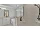 Modern bathroom with a standalone tub, glass shower, and neutral decor at 2255 Couples Dr, Lakeland, FL 33813