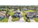 Well maintained home with lush lawn, mature landscaping, and a circular driveway, offering comfort and convenience at 2255 Couples Dr, Lakeland, FL 33813