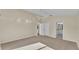 Spacious main bedroom with carpet, vaulted ceiling, ensuite bathroom, closet, and neutral decor at 2255 Couples Dr, Lakeland, FL 33813