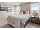Inviting main bedroom with neutral tones and large windows with lots of natural light at 226 Turtle Bay Ave, Winter Haven, FL 33881