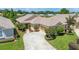 Expansive aerial view of a home with lush green landscaping and a well maintained exterior at 2425 Laurel Glen Dr, Lakeland, FL 33803