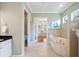 Bright bathroom with a soaking tub, walk-in closet and decorative elements at 2425 Laurel Glen Dr, Lakeland, FL 33803