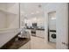 Well-equipped kitchen features granite counters, stainless steel appliances, and white cabinets at 2425 Laurel Glen Dr, Lakeland, FL 33803