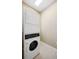 Efficient laundry room featuring a stackable washer and dryer set at 2425 Laurel Glen Dr, Lakeland, FL 33803