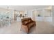 Inviting living area with tiled floors, comfortable seating, open to a modern kitchen and dining area at 2425 Laurel Glen Dr, Lakeland, FL 33803