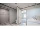 Bathroom with double sinks, toilet and walk-in closet at 246 Quail Run, Frostproof, FL 33843