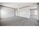Large bedroom boasts neutral carpet and opens to additional rooms at 246 Quail Run, Frostproof, FL 33843