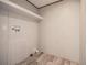 A utility room features neutral walls and floor coverings at 246 Quail Run, Frostproof, FL 33843