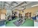 Spacious home garage gym featuring weights, a squat rack, and ample space for fitness activities at 2464 Laurel Glen Dr, Lakeland, FL 33803