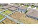 Aerial view of home showing the backyard with a white fence, ready for landscaping at 2546 Red Egret Dr, Bartow, FL 33830