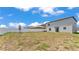Large backyard with lawn and privacy fence, ready for outdoor living at 2546 Red Egret Dr, Bartow, FL 33830