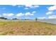 Spacious backyard enclosed by a white vinyl fence, great for outdoor activities at 2546 Red Egret Dr, Bartow, FL 33830