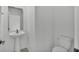 Bathroom featuring sleek fixtures, neutral paint, and toilet at 2546 Red Egret Dr, Bartow, FL 33830
