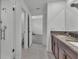 The bathroom features a modern glass enclosed shower and double sink vanity at 2546 Red Egret Dr, Bartow, FL 33830