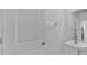 Bathroom featuring sleek fixtures, neutral paint, and mirrored vanity at 2546 Red Egret Dr, Bartow, FL 33830