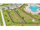 Dog park featuring separate fenced areas, benches, and well-maintained grass for community use at 2546 Red Egret Dr, Bartow, FL 33830