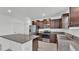 Bright kitchen with stainless appliances and granite countertops at 2546 Red Egret Dr, Bartow, FL 33830