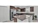 Bright kitchen with stainless appliances, granite countertops, and an island at 2546 Red Egret Dr, Bartow, FL 33830