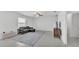 Modern living room featuring neutral colors, tile flooring, and contemporary furniture at 2546 Red Egret Dr, Bartow, FL 33830