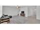 Living room featuring new ceiling fan, modern tile floor, and large windows at 2546 Red Egret Dr, Bartow, FL 33830
