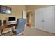 A dedicated office space features a sleek desk, comfortable chair, and ample storage at 2731 Coventry Ave, Lakeland, FL 33803