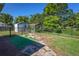 Spacious backyard featuring a shed, dog kennel, and a patio area ideal for outdoor activities at 2757 Pine Acres Dr, Lake Wales, FL 33898