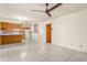Open-concept living space with tile floors, seamlessly connecting the kitchen and living areas at 2757 Pine Acres Dr, Lake Wales, FL 33898
