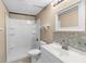 Bathroom featuring a shower-tub combo and a single sink vanity at 2920 Audie Combee Rd, Lakeland, FL 33801