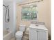 Bathroom featuring a tub-shower combo and a vanity at 2920 Audie Combee Rd, Lakeland, FL 33801