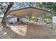 Large carport with ample space for parking and storage at 2920 Audie Combee Rd, Lakeland, FL 33801