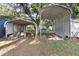 Multiple carports provide ample covered storage on the property at 2920 Audie Combee Rd, Lakeland, FL 33801
