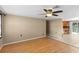 Cozy living room with wood laminate flooring and an open layout at 2920 Audie Combee Rd, Lakeland, FL 33801