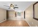 Open living space with view to dining area and sliding door entrance at 2920 Audie Combee Rd, Lakeland, FL 33801