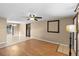 Spacious living area with ceiling fan and seamless transition to dining space at 2920 Audie Combee Rd, Lakeland, FL 33801