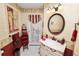 Bathroom with vanity, decorative mirror, and stylish fixtures at 2936 Grasslands Dr, Lakeland, FL 33803
