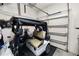 This garage provides secure parking for a golf cart and features extra storage at 2936 Grasslands Dr, Lakeland, FL 33803