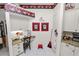 Charming kitchen nook with custom desk space, cabinets, and granite countertops at 2936 Grasslands Dr, Lakeland, FL 33803