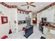 Spacious kitchen with granite countertops, white cabinets, and stainless steel appliances, with a kitchen island at 2936 Grasslands Dr, Lakeland, FL 33803